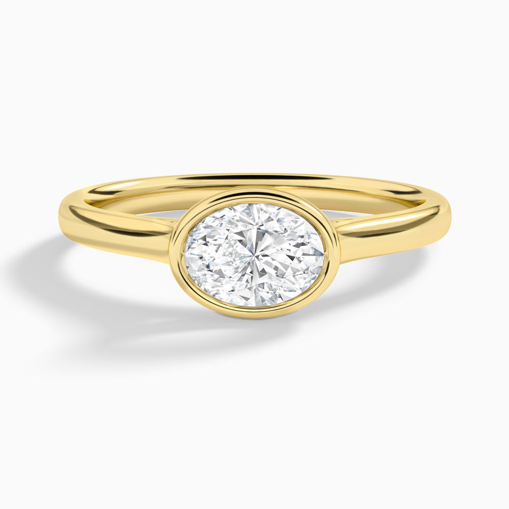 Oval Alma East-West Bezel Solitaire Diamond Engagement Ring In 18K Yellow Gold - Lucenjuri