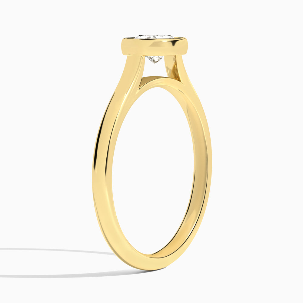 Oval Alma East-West Bezel Solitaire Diamond Engagement Ring In 18K Yellow Gold, Angle View