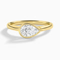 Pear Alma East-West Bezel Solitaire Diamond Engagement Ring In 18K Yellow Gold - Lucenjuri