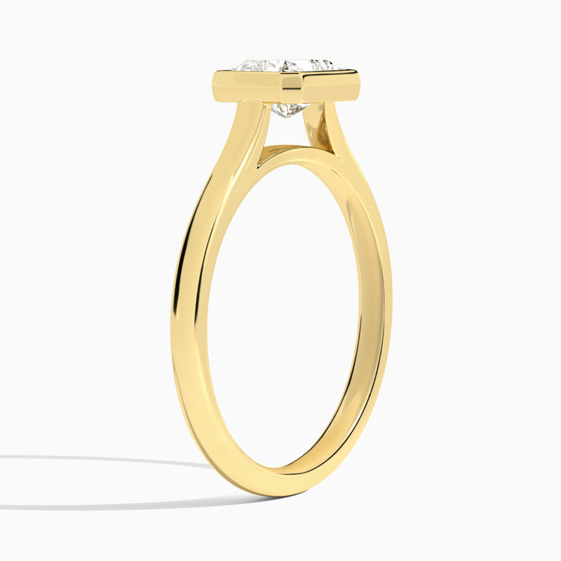 Radiant Alma East-West Bezel Solitaire Diamond Engagement Ring In 18K Yellow Gold, Angle View