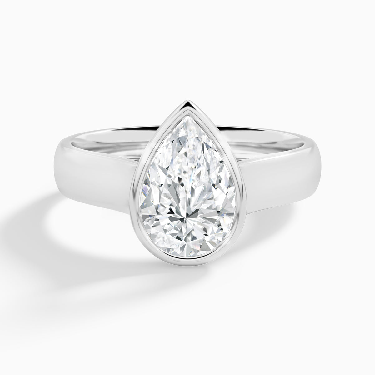 Pear Alma 4mm Bezel Solitaire Diamond Engagement Ring In 18K White Gold - Lucenjuri