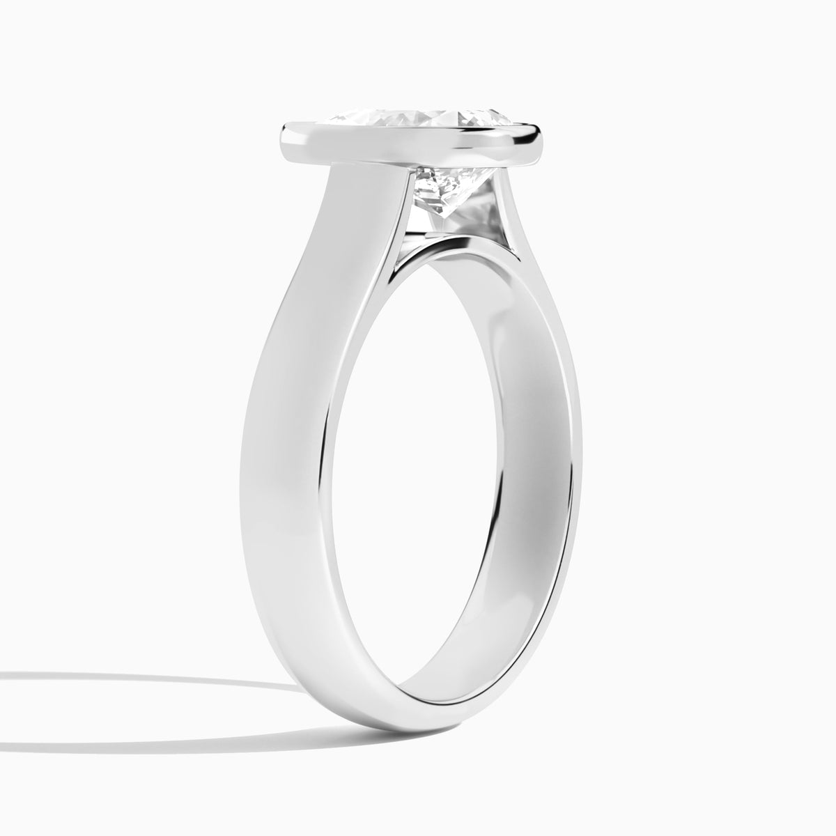Pear Alma 4mm Bezel Solitaire Diamond Engagement Ring In 18K White Gold, Angle View