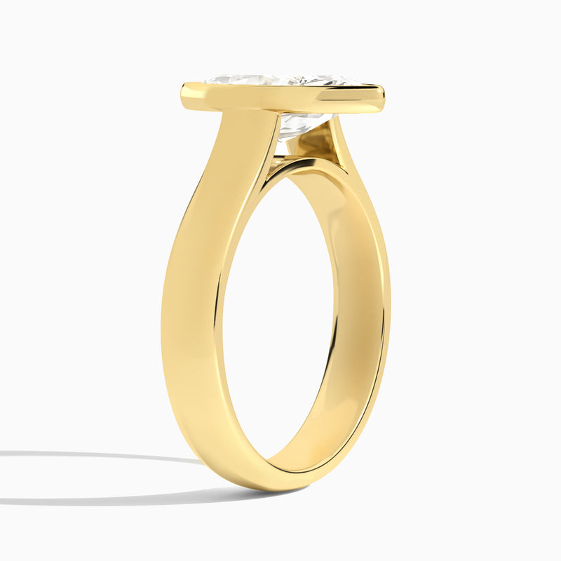 Marquise Alma 4mm Bezel Solitaire Diamond Engagement Ring In 18K Yellow Gold, Angle View