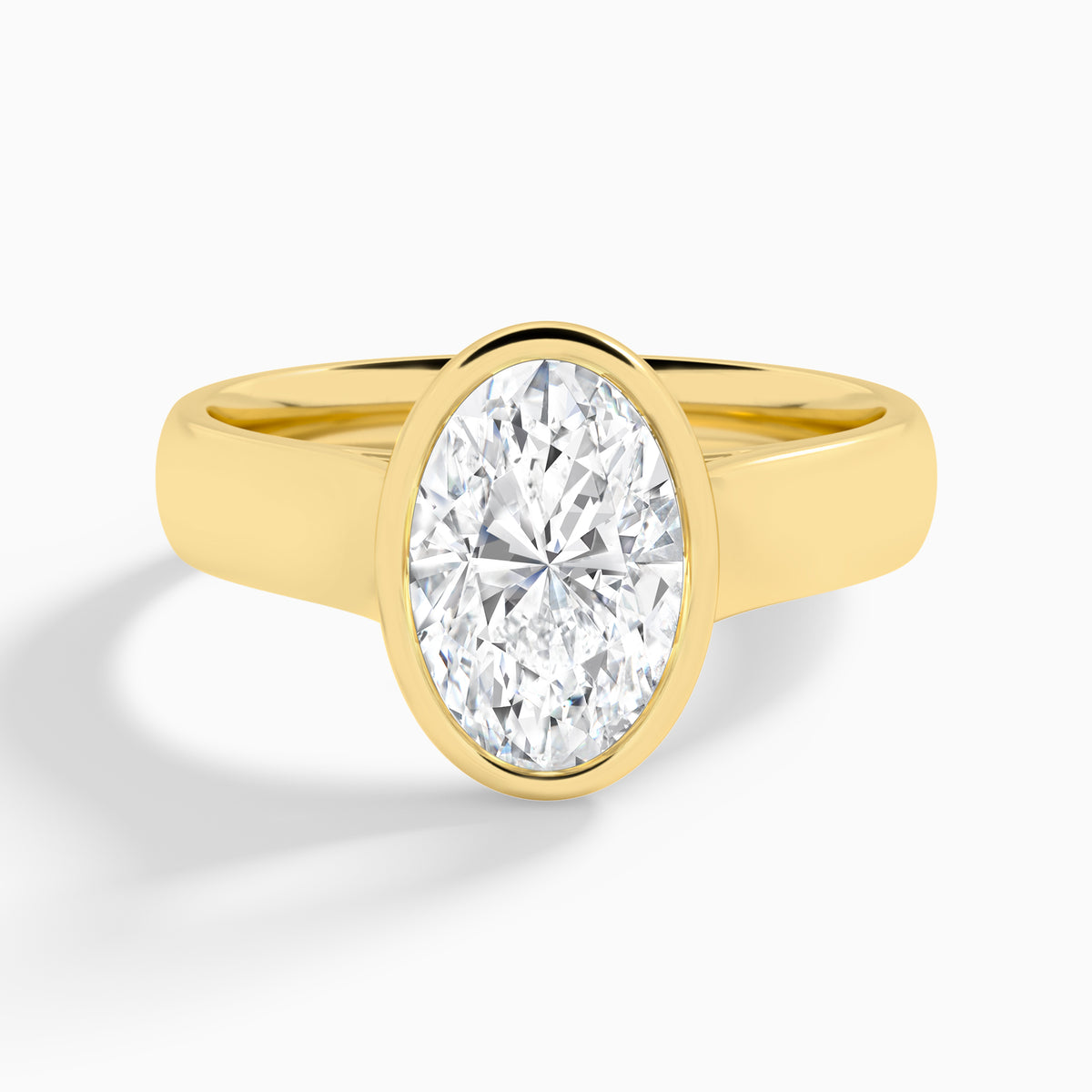 Oval Alma 4mm Bezel Solitaire Diamond Engagement Ring In 18K Yellow Gold - Lucenjuri