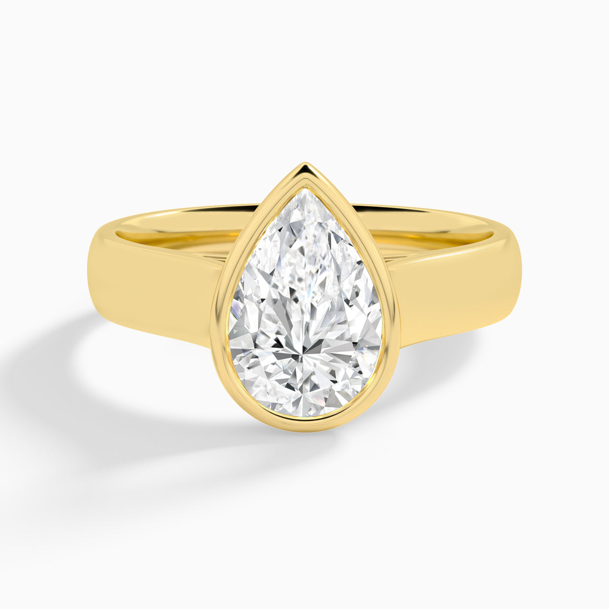 Pear Alma 4mm Bezel Solitaire Diamond Engagement Ring In 18K Yellow Gold - Lucenjuri