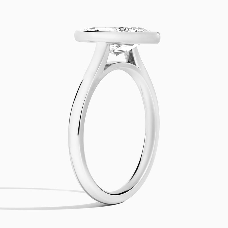 Marquise Alma 2mm Bezel Solitaire Diamond Engagement Ring In Platinum, Angle View