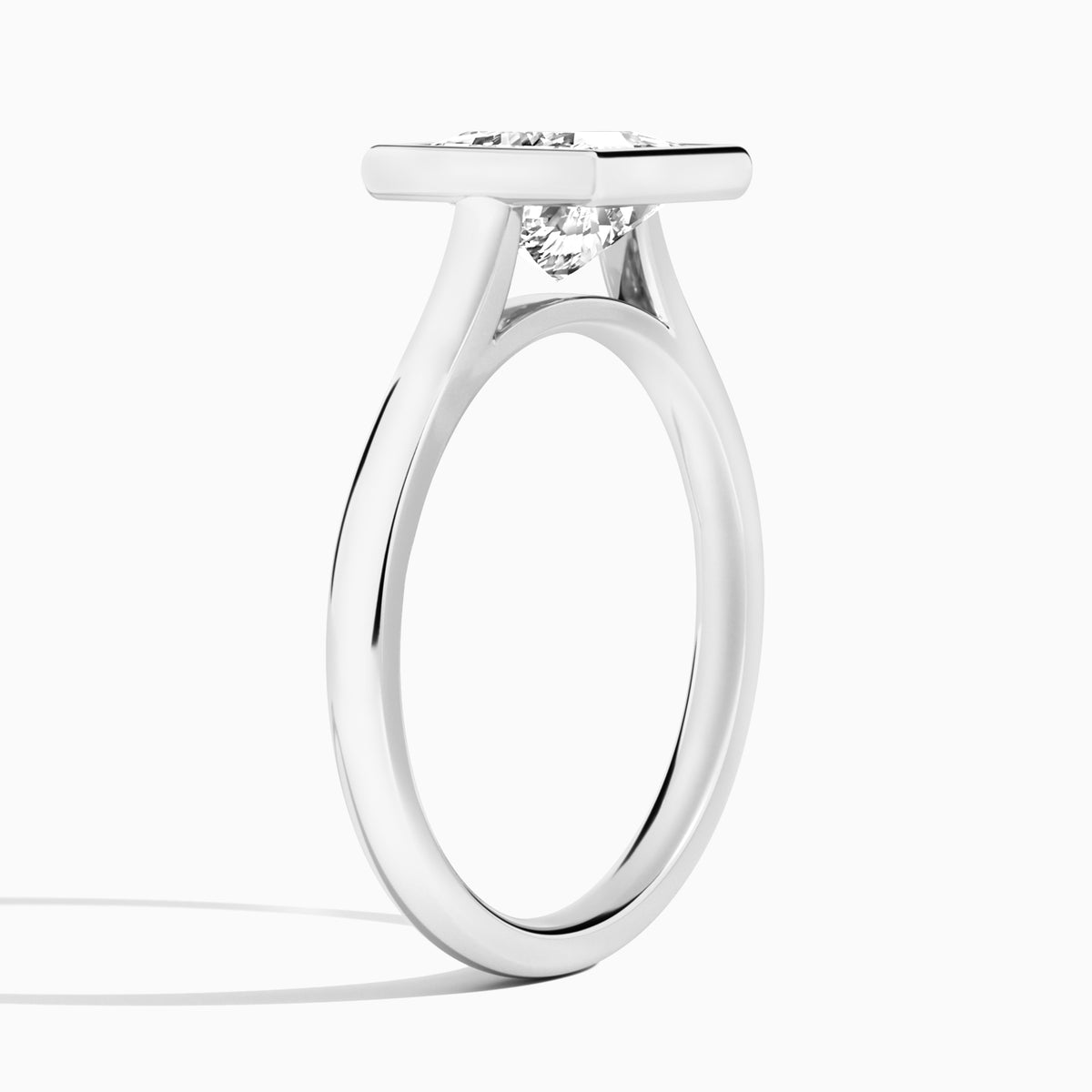 Princess Alma 2mm Bezel Solitaire Diamond Engagement Ring In Platinum, Angle View