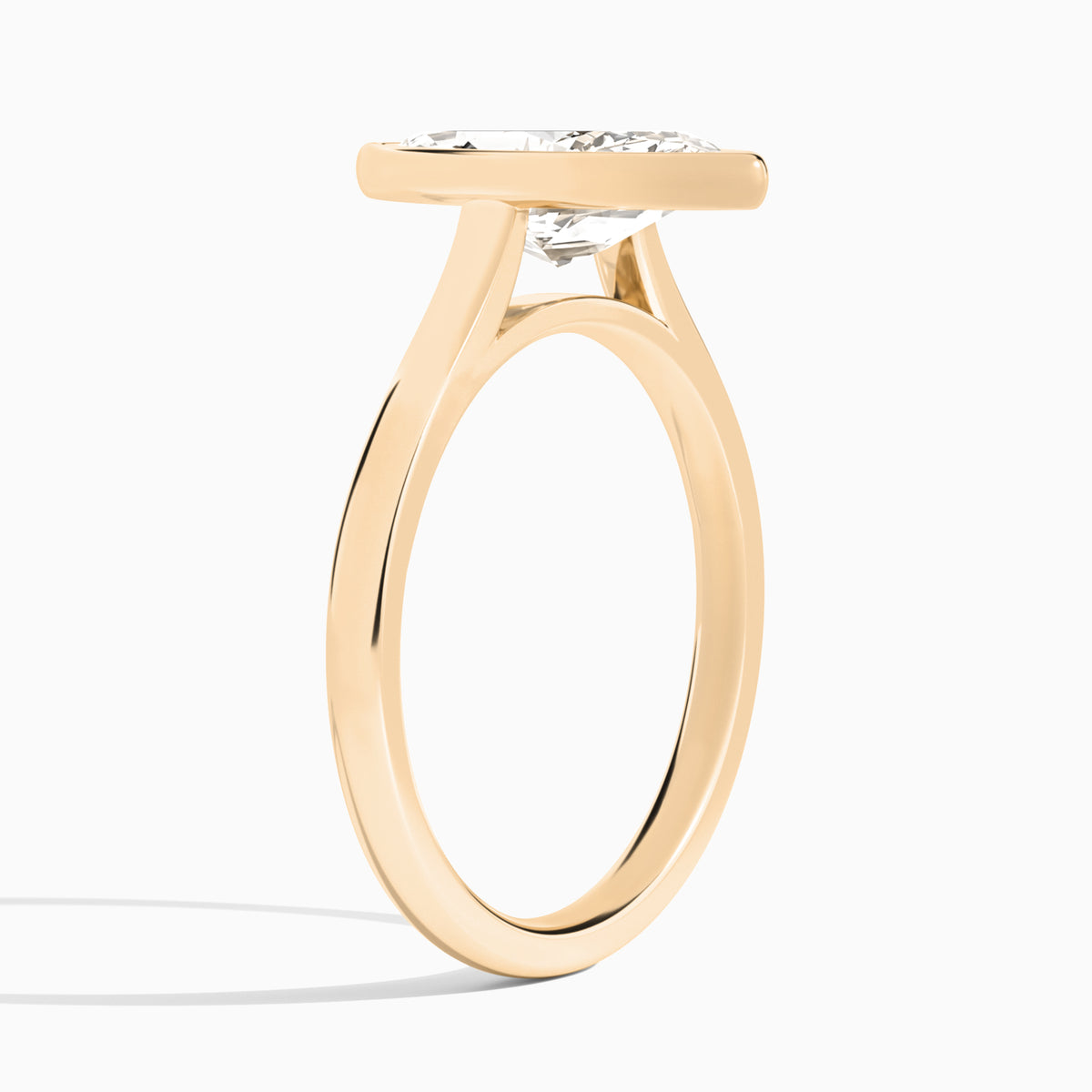 Marquise Alma 2mm Bezel Solitaire Diamond Engagement Ring In 14K Rose Gold, Angle View