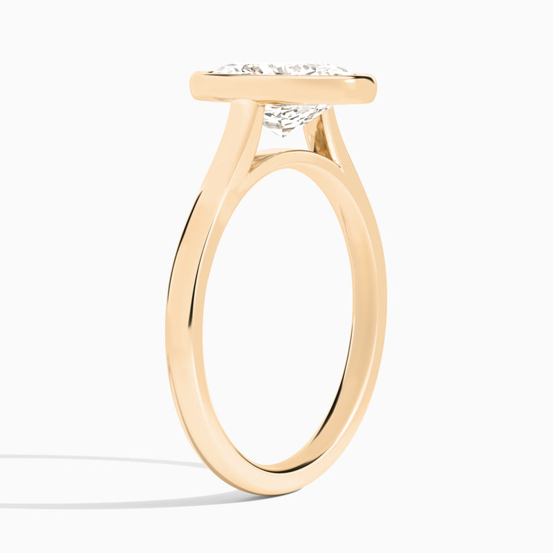 Oval Alma 2mm Bezel Solitaire Diamond Engagement Ring In 14K Rose Gold, Angle View