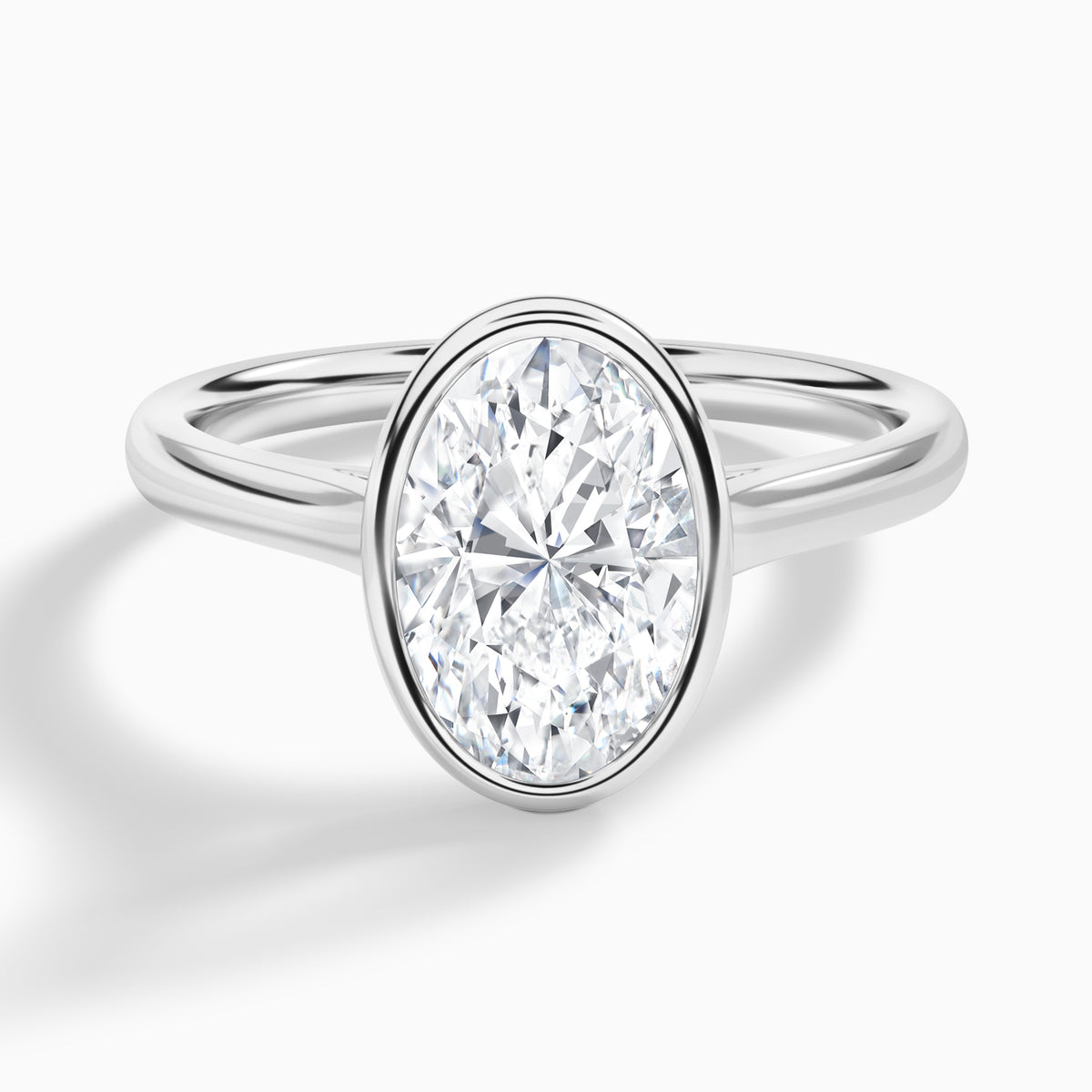 Oval Alma 2mm Bezel Solitaire Diamond Engagement Ring In 18K White Gold - Lucenjuri