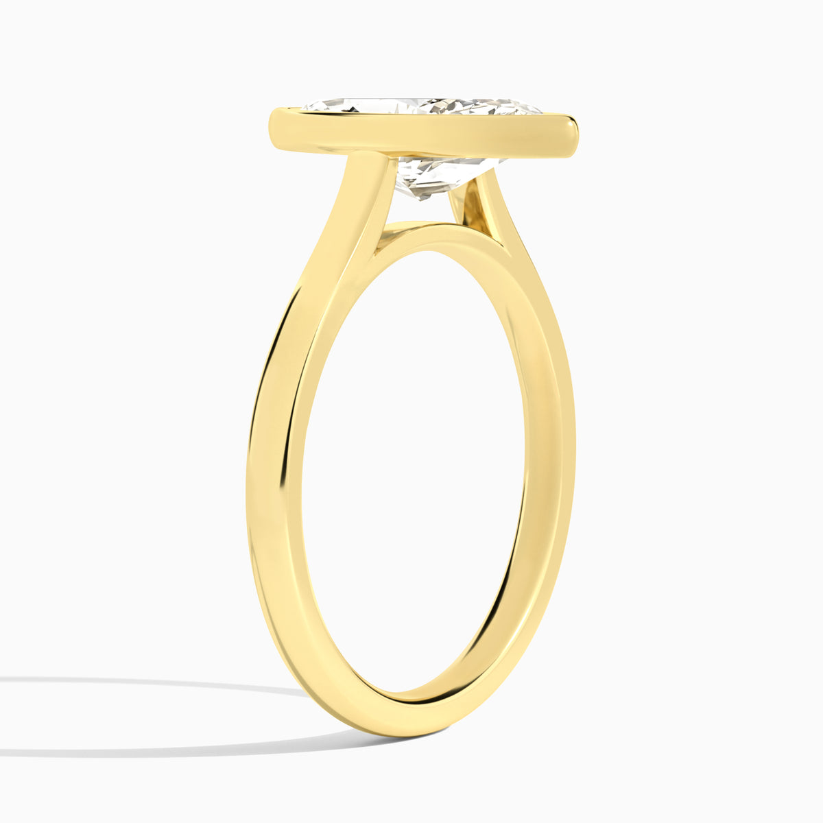 Marquise Alma 2mm Bezel Solitaire Diamond Engagement Ring In 18K Yellow Gold, Angle View