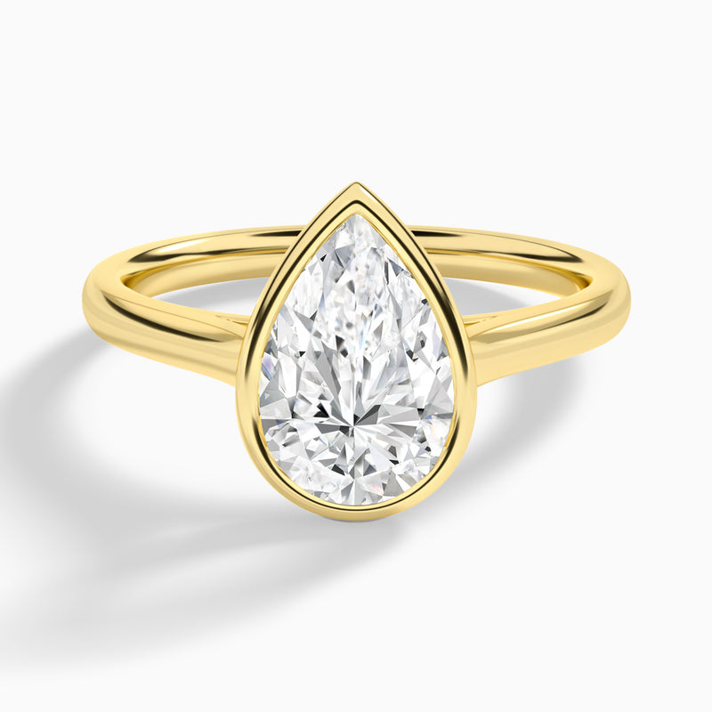 Pear Alma 2mm Bezel Solitaire Diamond Engagement Ring In 18K Yellow Gold - Lucenjuri