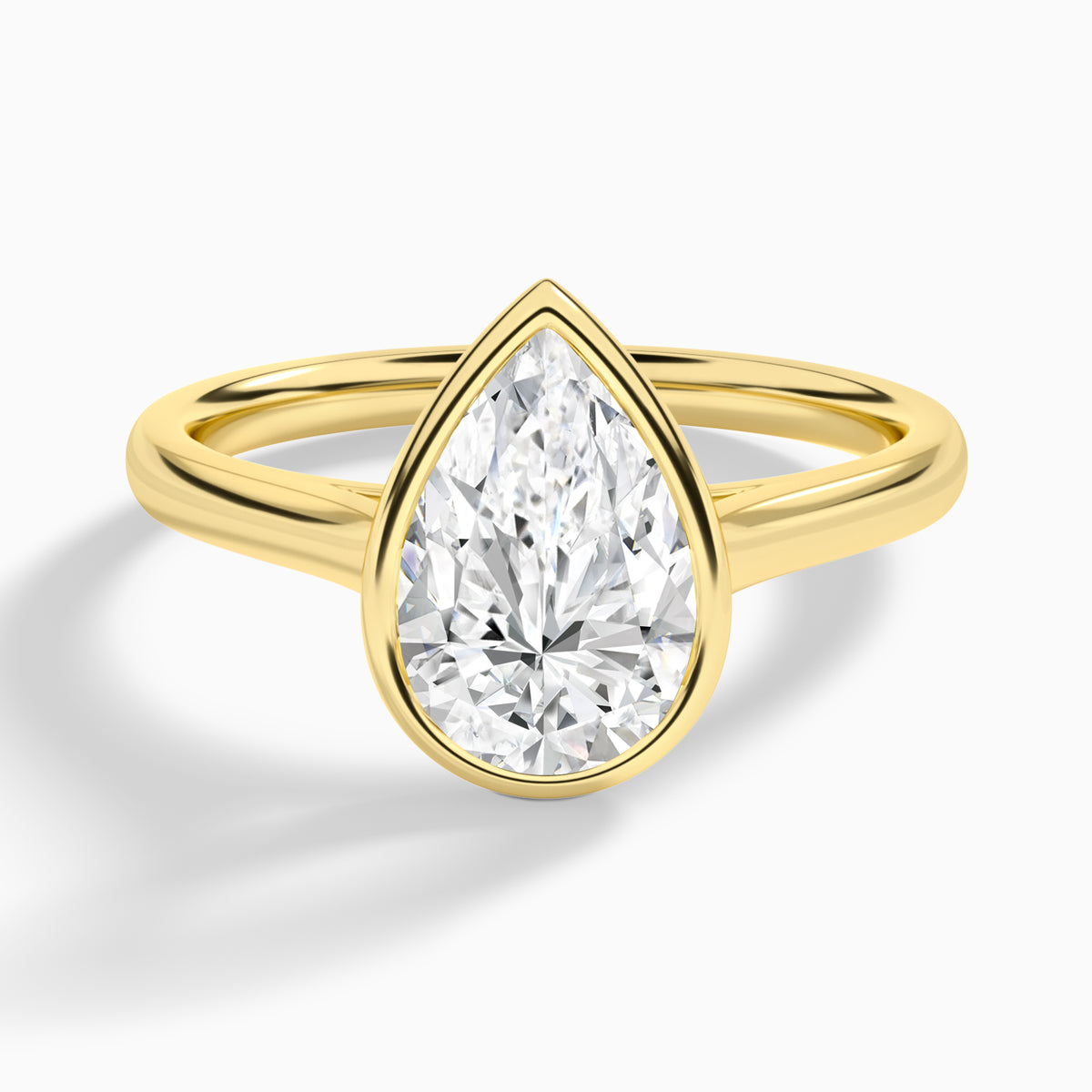 Pear Alma 2mm Bezel Solitaire Diamond Engagement Ring In 18K Yellow Gold - Lucenjuri