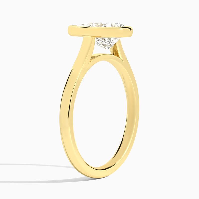 Pear Alma 2mm Bezel Solitaire Diamond Engagement Ring In 18K Yellow Gold, Angle View