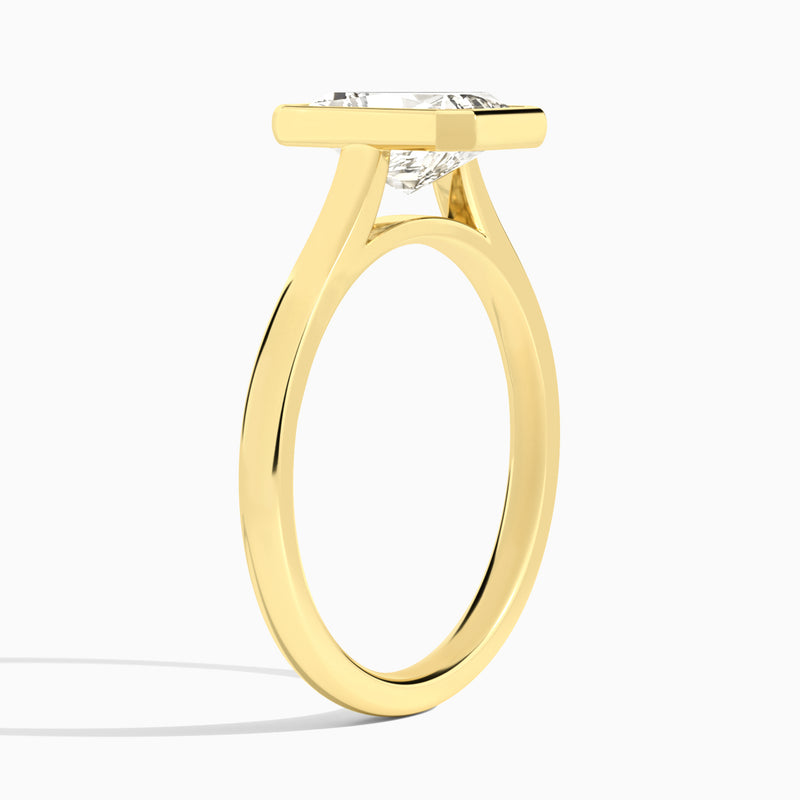 Radiant Alma 2mm Bezel Solitaire Diamond Engagement Ring In 18K Yellow Gold, Angle View