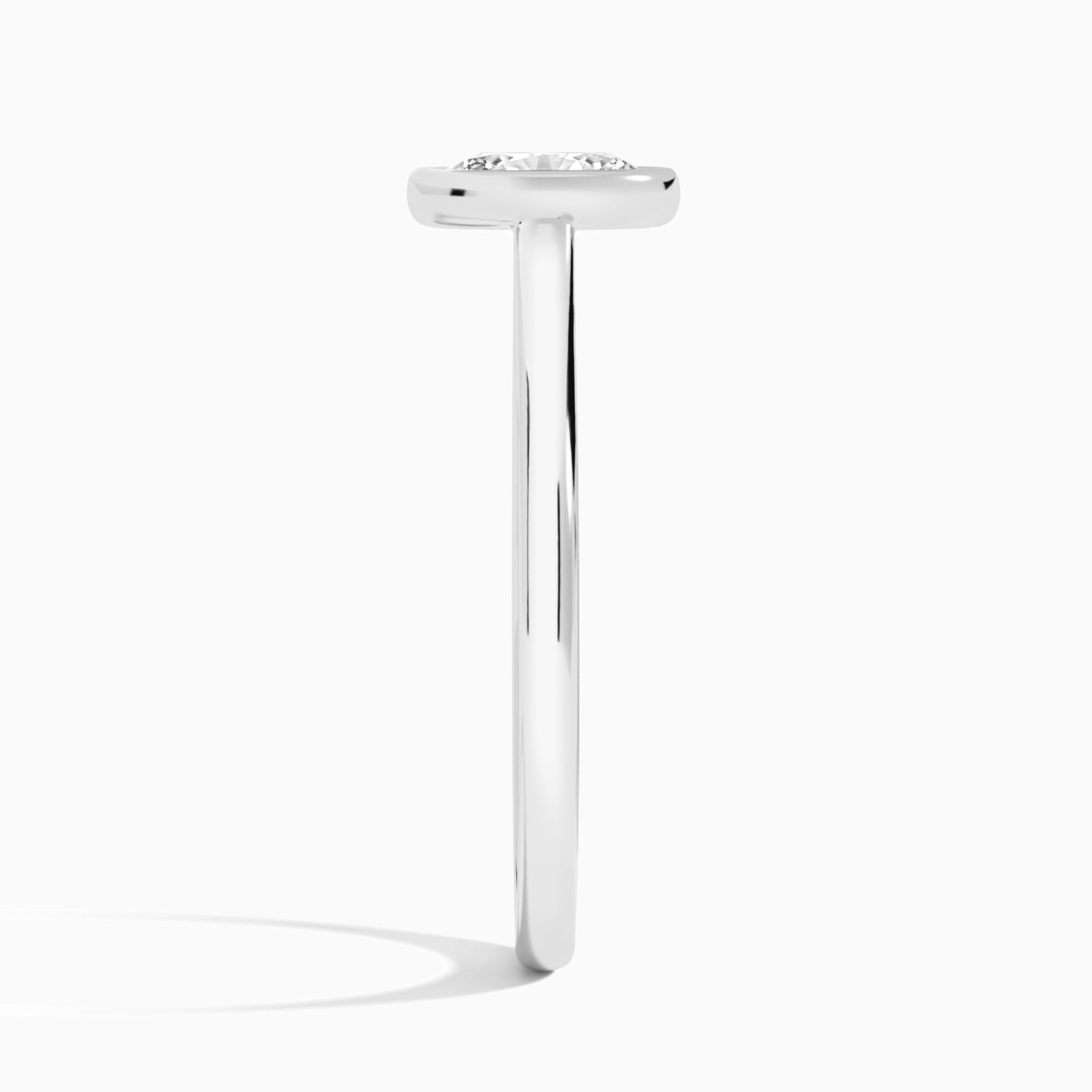 Oval Petite Alma 1.6mm Bezel Solitaire Diamond Engagement Ring In Platinum, Side View