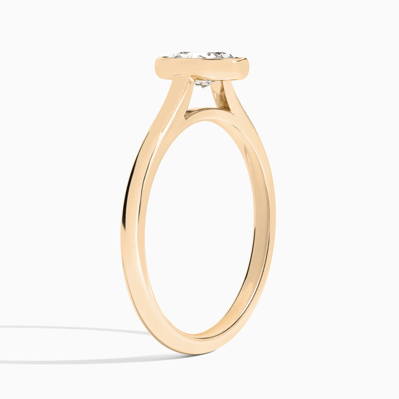 Oval Petite Alma 1.6mm Bezel Solitaire Diamond Engagement Ring In 14K Rose Gold, Angle View