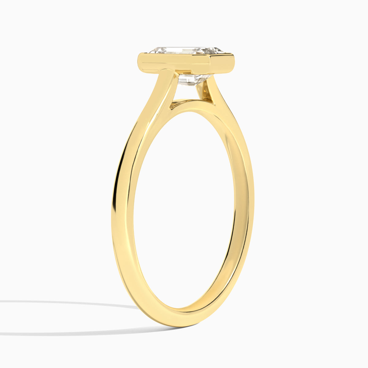 Emerald Petite Alma 1.6mm Bezel Solitaire Diamond Engagement Ring In 18K Yellow Gold, Angle View