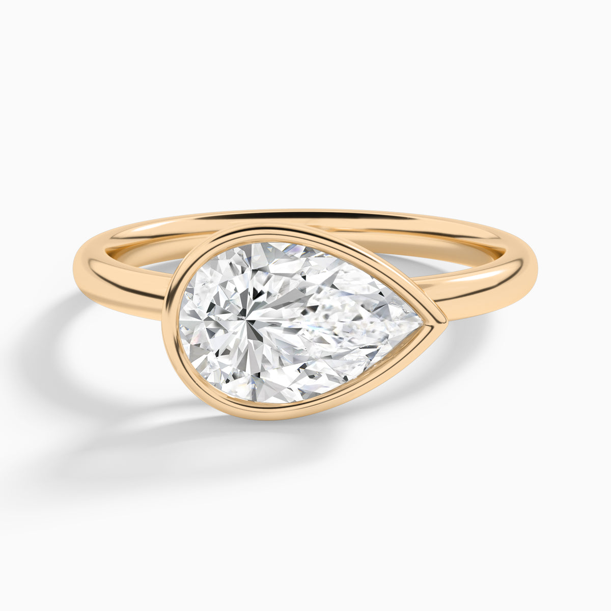 Pear Elle East-West 2mm Bezel Solitaire Diamond Engagement Ring In 14K Rose Gold - Lucenjuri