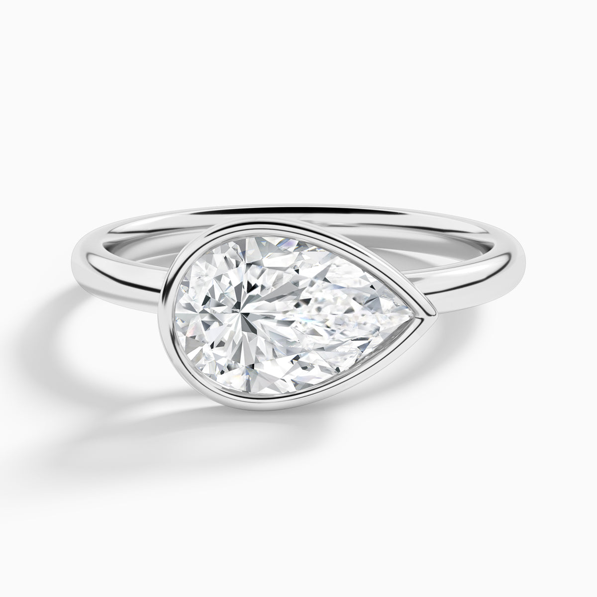 Pear Elle East-West 2mm Bezel Solitaire Diamond Engagement Ring In 18K White Gold - Lucenjuri