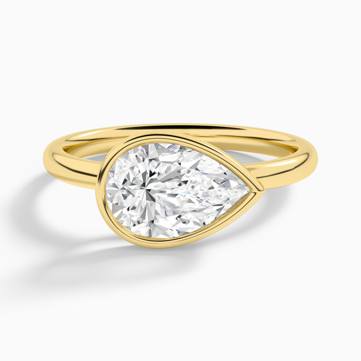 Pear Elle East-West 2mm Bezel Solitaire Diamond Engagement Ring In 18K Yellow Gold - Lucenjuri