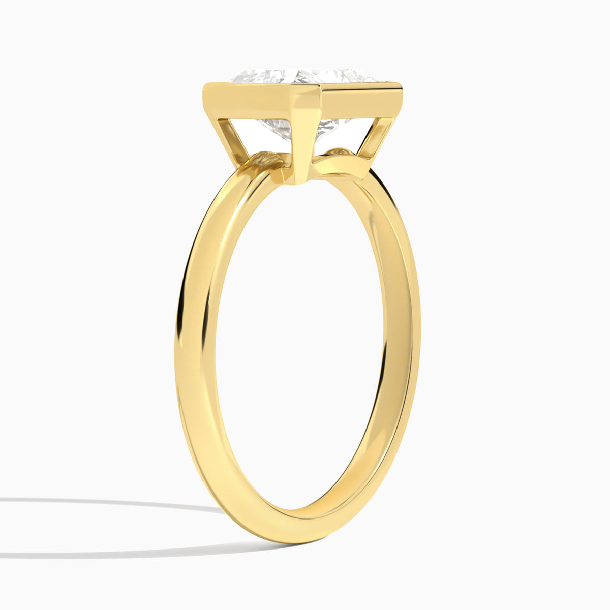 Radiant Elle East-West 2mm Bezel Solitaire Diamond Engagement Ring In 18K Yellow Gold, Angle View