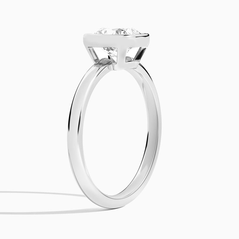 Cushion Elle 2mm Bezel Solitaire Diamond Engagement Ring In Platinum, Angle View