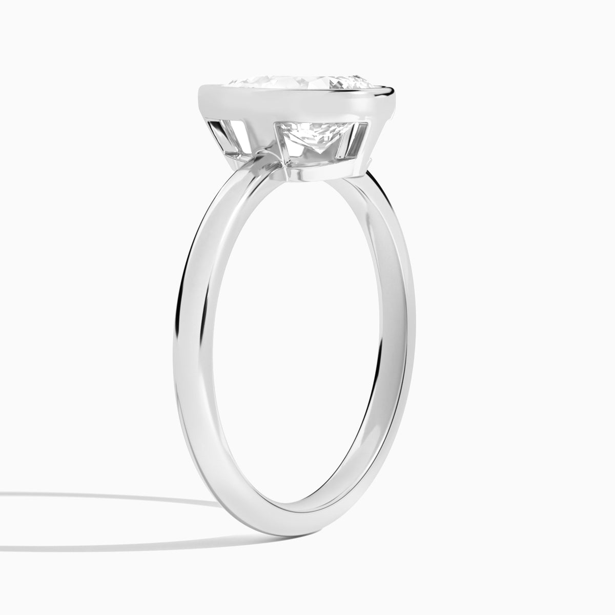 Pear Elle 2mm Bezel Solitaire Diamond Engagement Ring In Platinum, Angle View