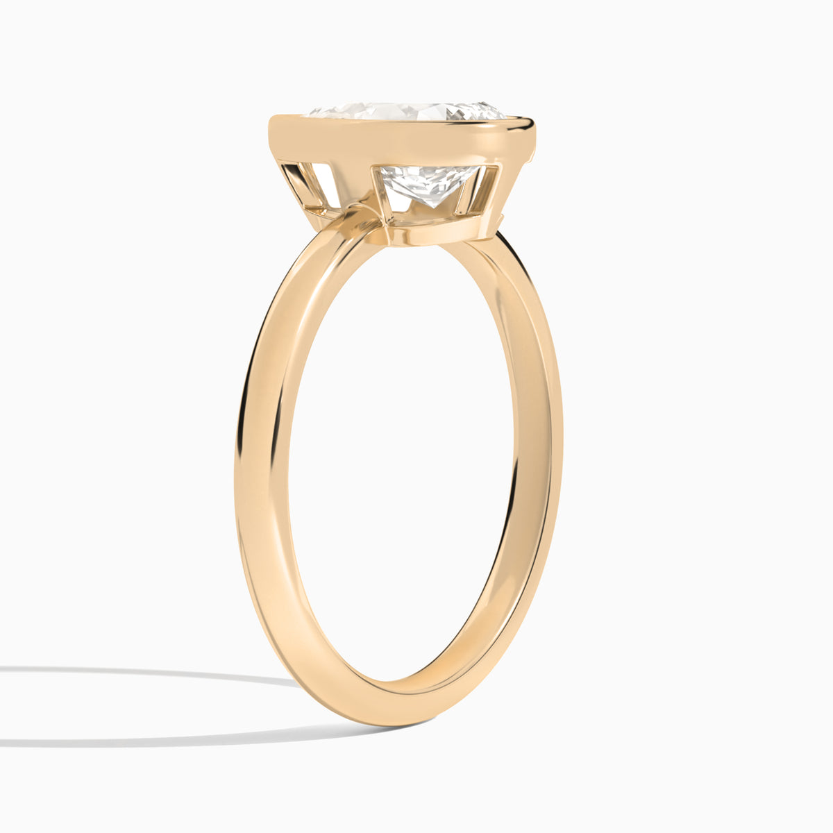 Pear Elle 2mm Bezel Solitaire Diamond Engagement Ring In 14K Rose Gold, Angle View