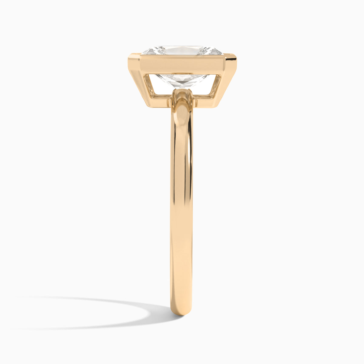 Radiant Elle 2mm Bezel Solitaire Diamond Engagement Ring In 14K Rose Gold, Side View