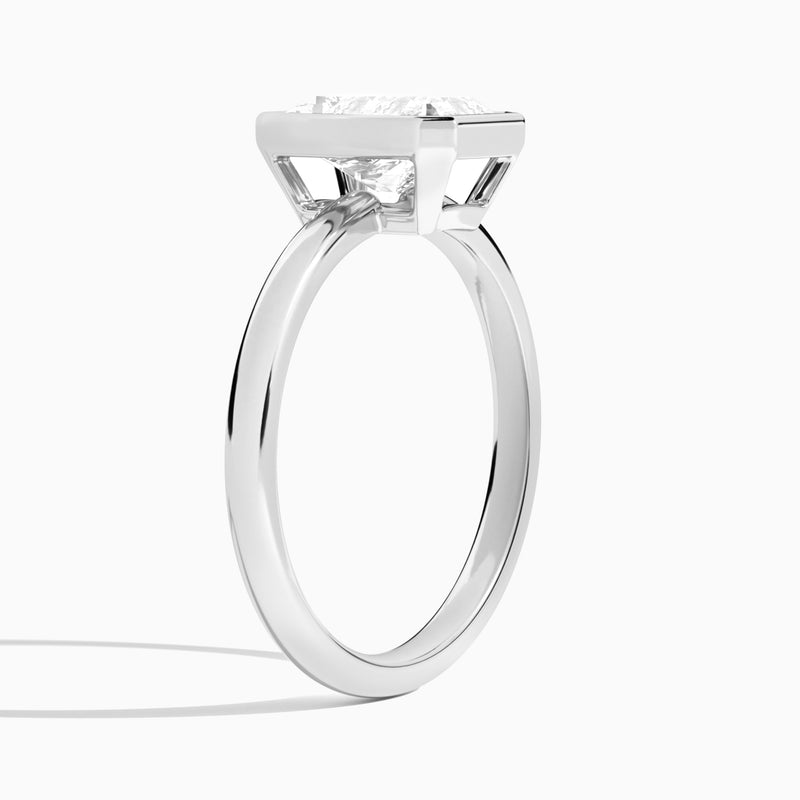 Radiant Elle 2mm Bezel Solitaire Diamond Engagement Ring In 18K White Gold, Angle View