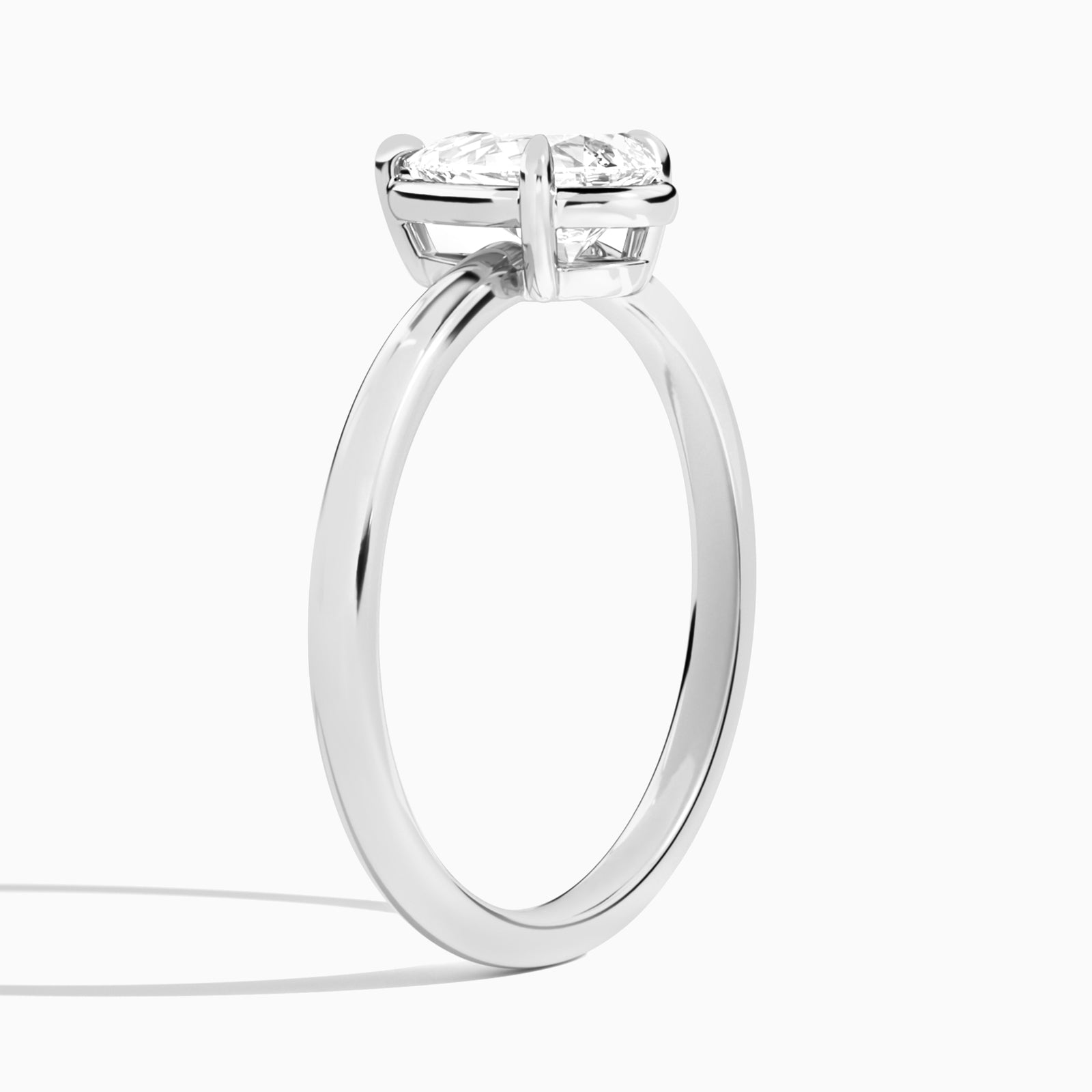 Pear Prong Bezel Solitaire Diamond Engagement Ring In Platinum, Angle View