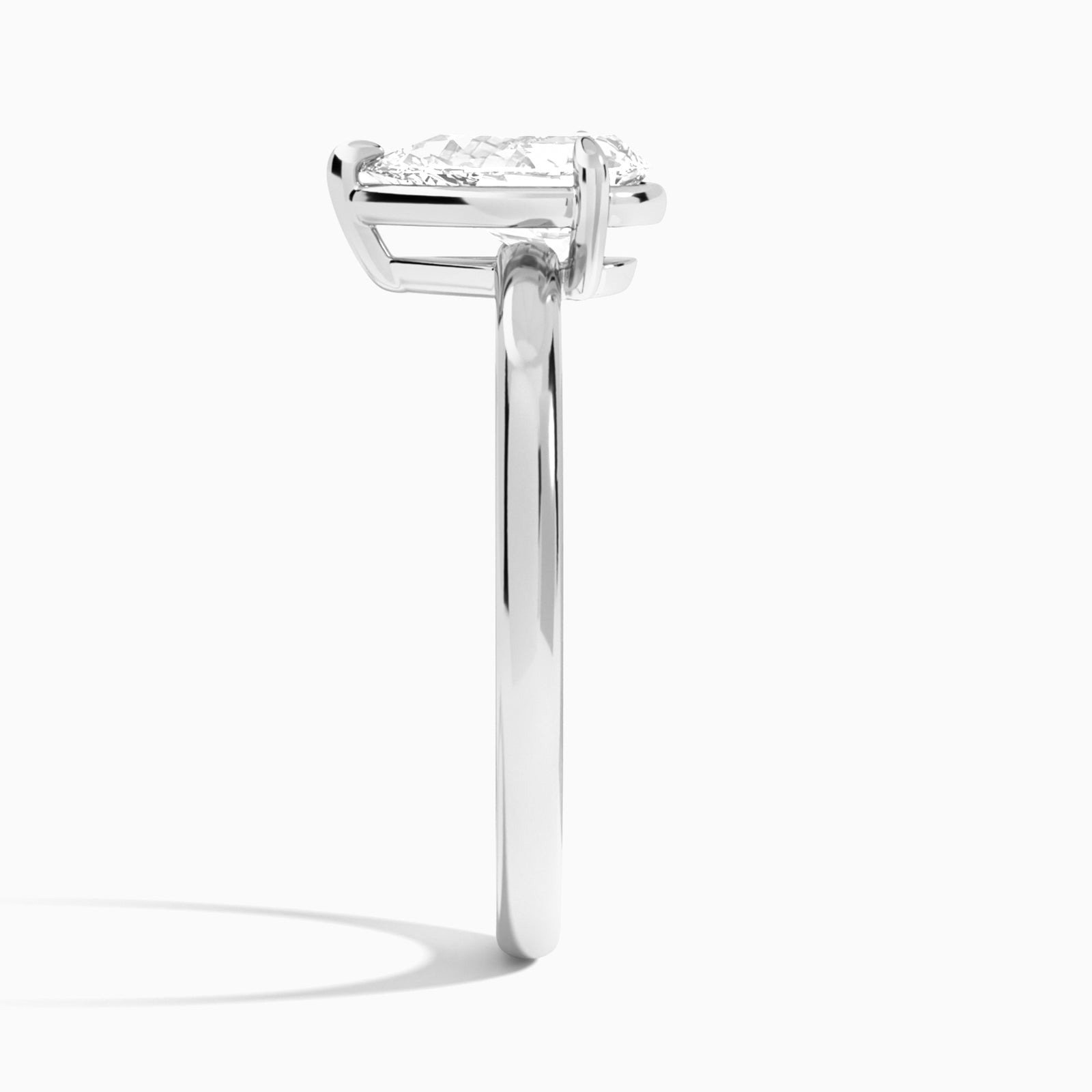 Pear Prong Bezel Solitaire Diamond Engagement Ring In Platinum, Side View