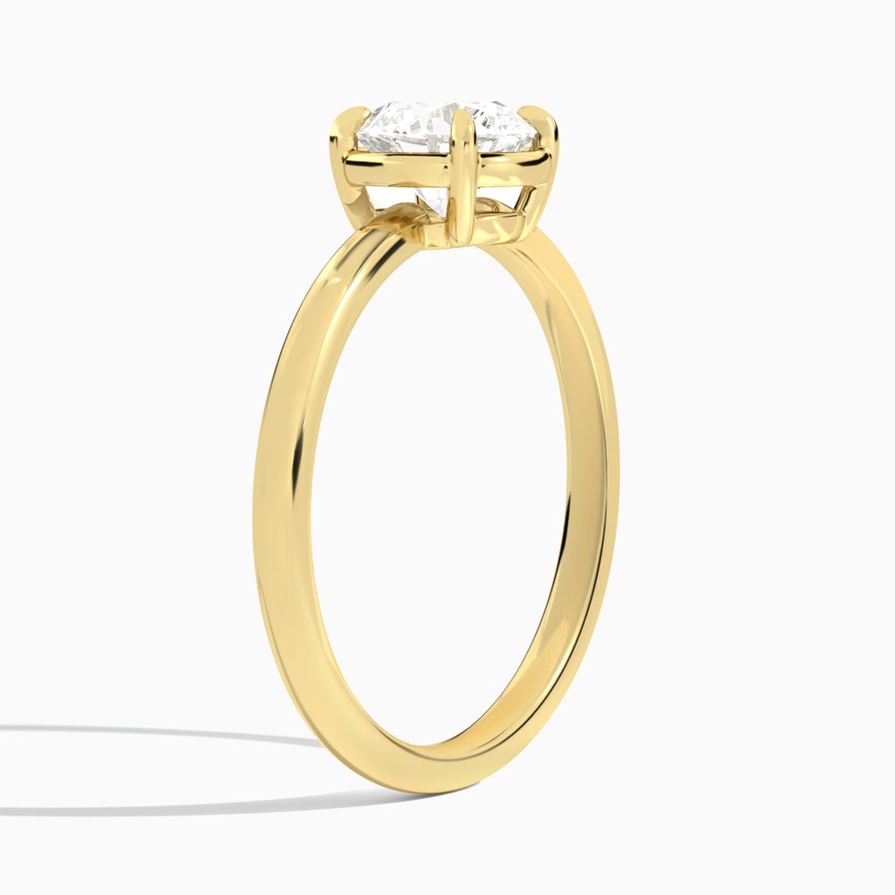 Round Prong Bezel Solitaire Diamond Engagement Ring In 18K Yellow Gold, Angle View