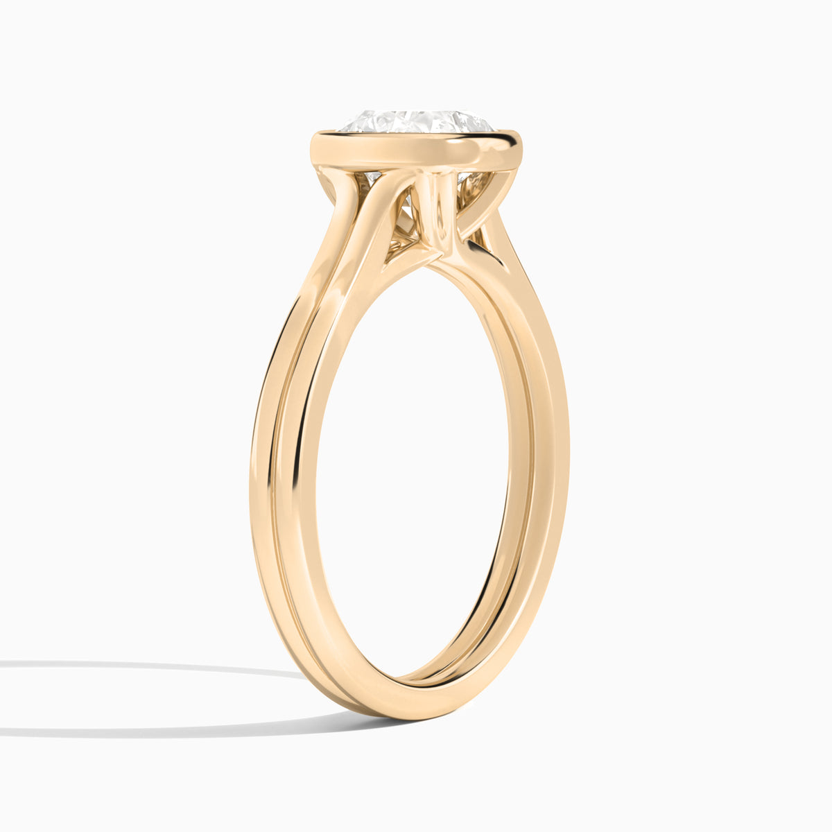 Cushion Bezel Solitaire Double Band Diamond Engagement Ring In 14K Rose Gold, Angle View