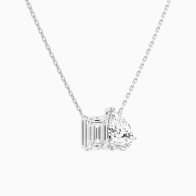 Toi Et Moi Emerald and Pear Lab Grown Diamond Necklace In Platinum - Front Angle View