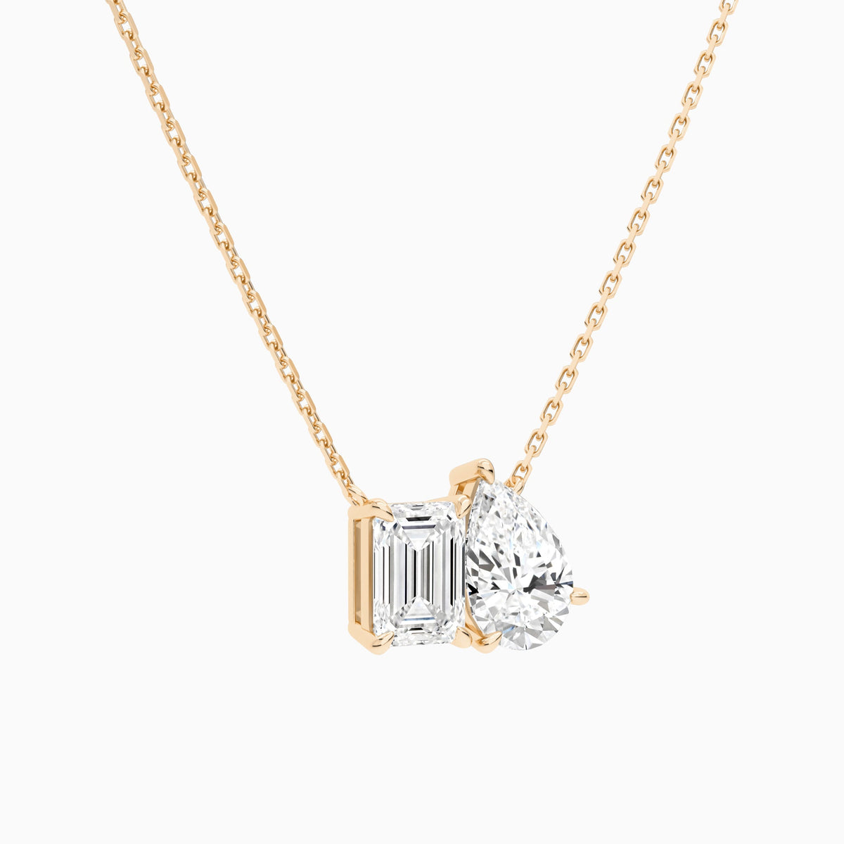 Toi Et Moi Emerald and Pear Lab Grown Diamond Necklace In 14K Rose Gold - Front Angle View