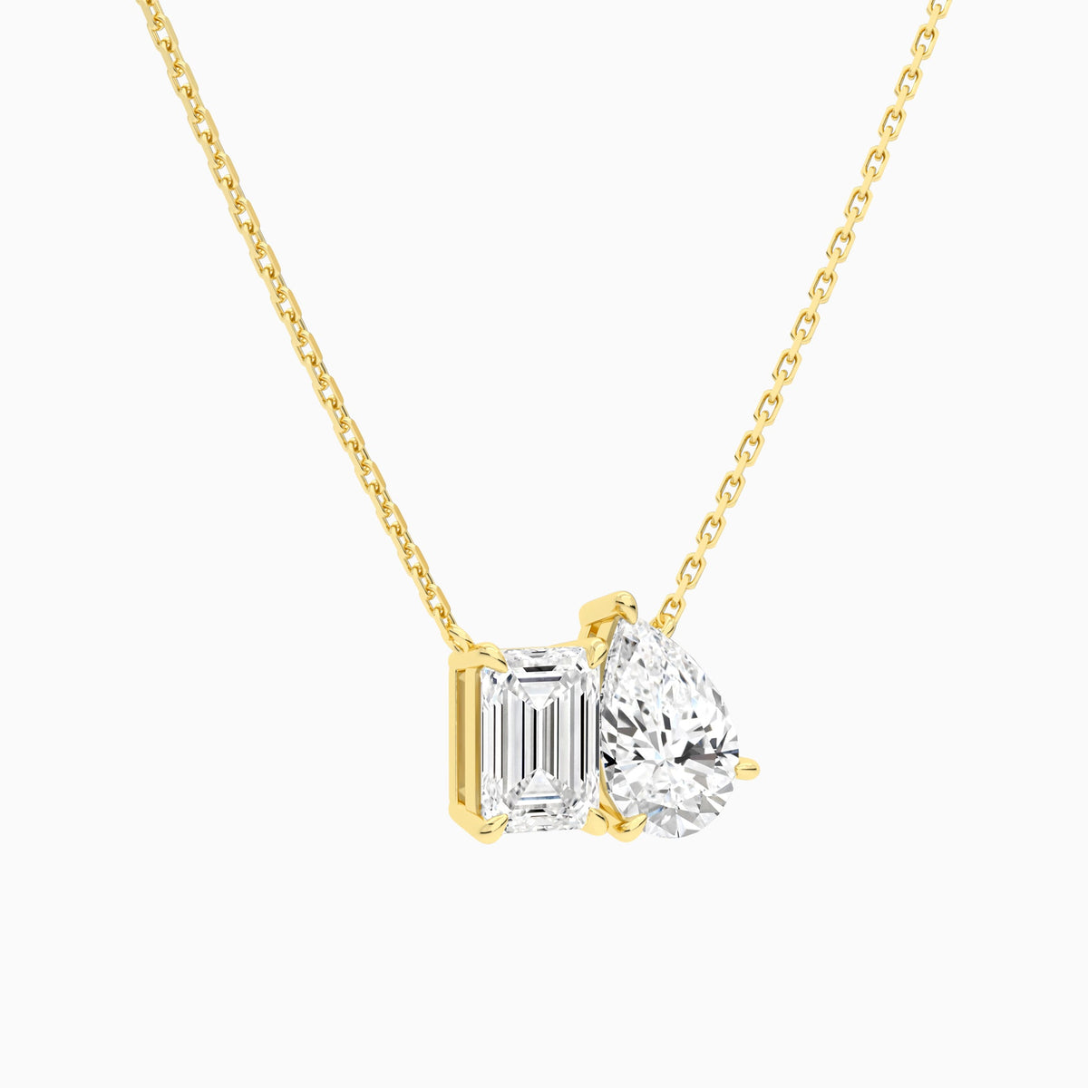 Toi Et Moi Emerald and Pear Lab Grown Diamond Necklace In 18K Yellow Gold - Front Angle View