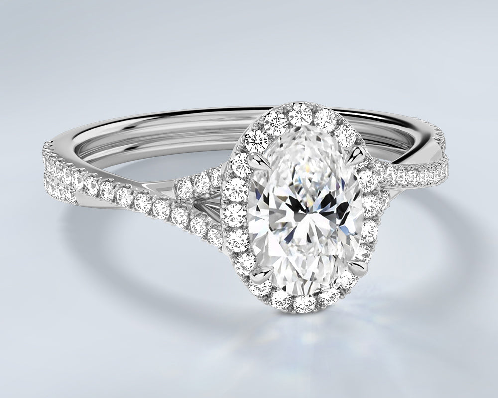 18K white gold lab diamond ring with a oval-shaped center stone on a light gray background