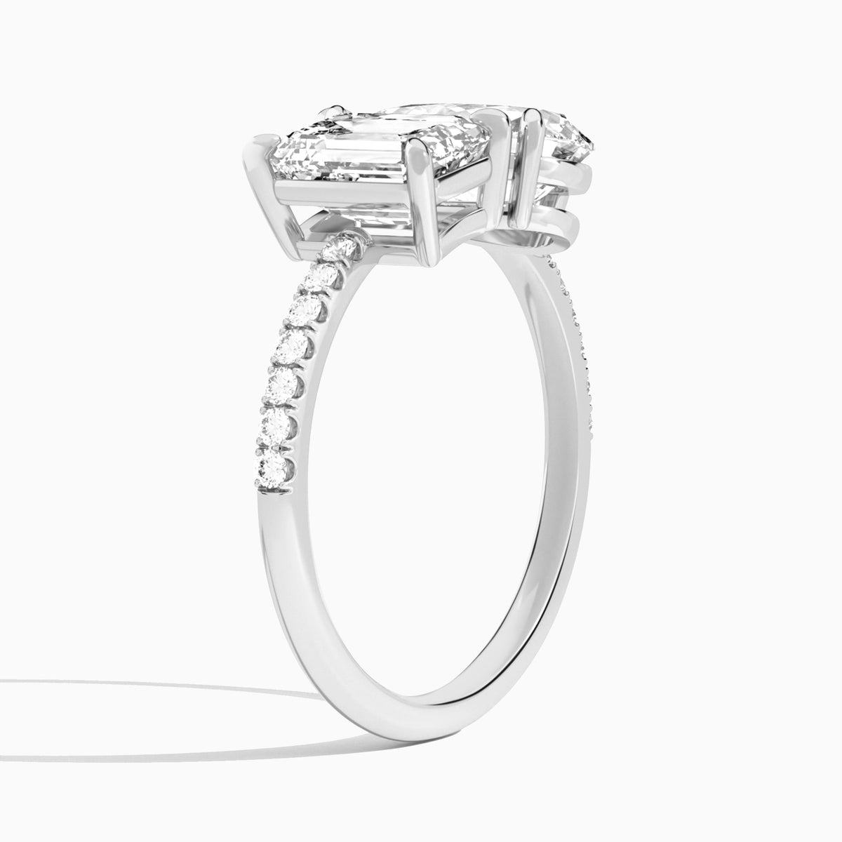 Toi Et Moi Emerald and Pear Accented Diamond Engagement Ring In 18K White Gold, Angle View