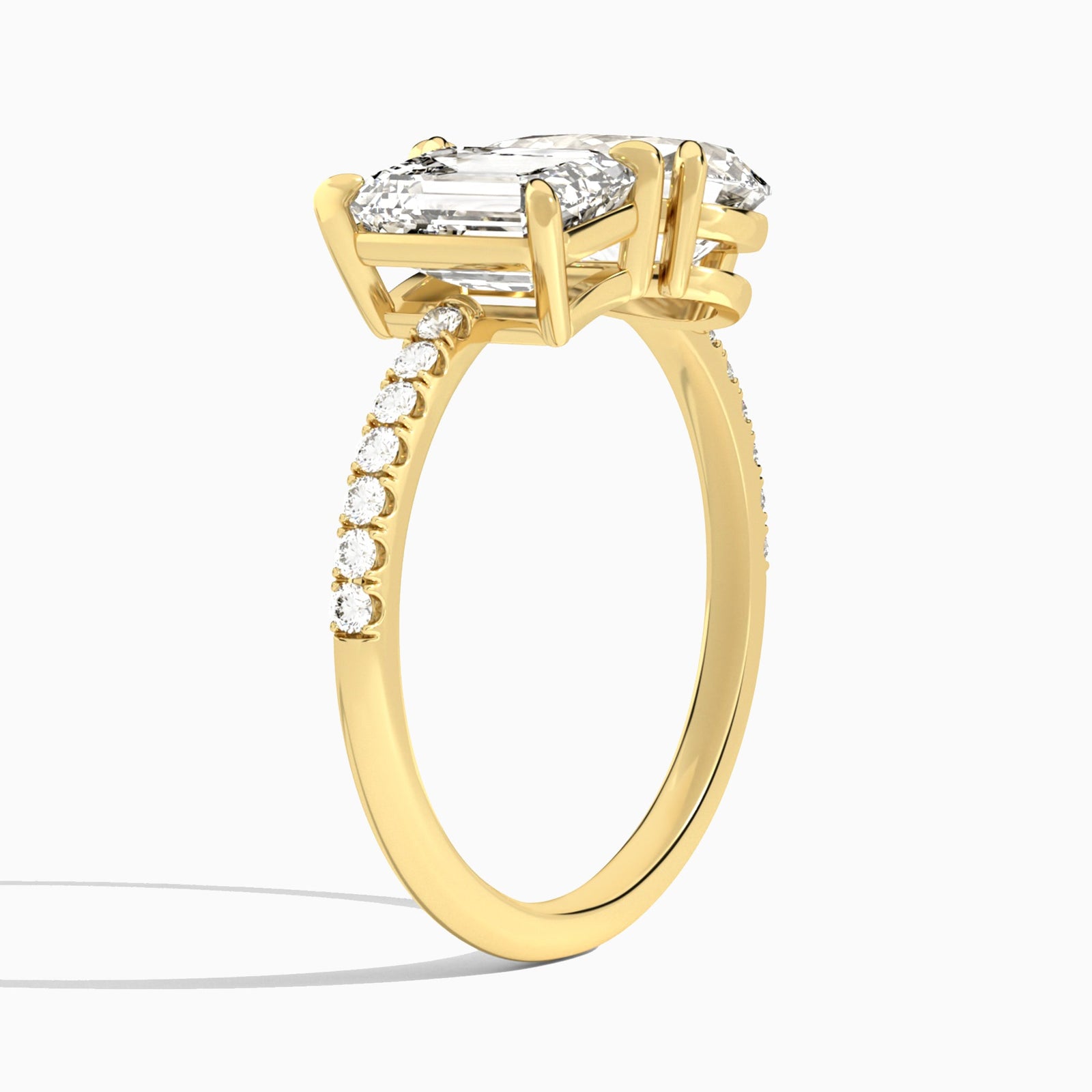 Toi Et Moi Emerald and Pear Accented Diamond Engagement Ring In 14K Yellow Gold, Angle View