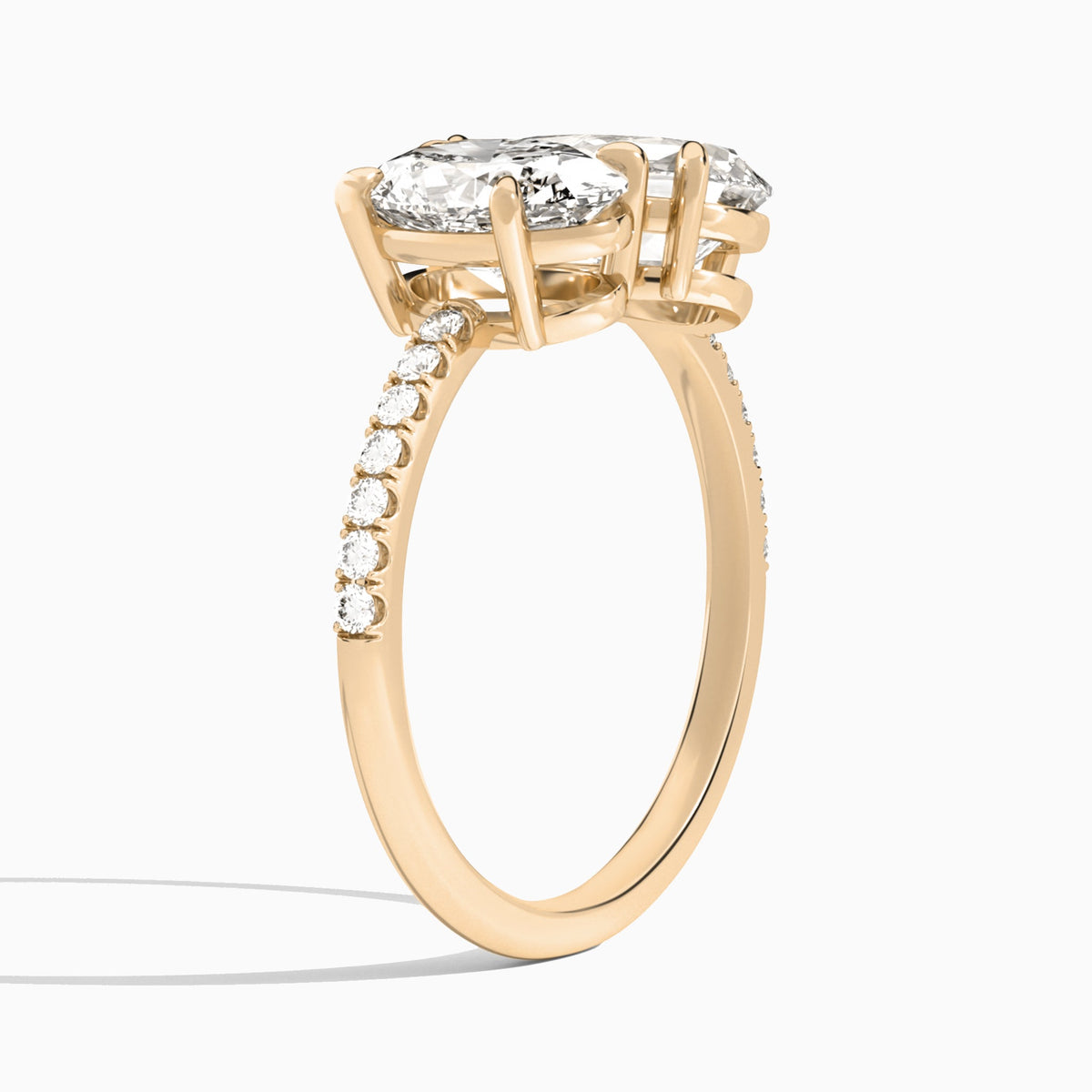 Toi Et Moi Oval and Pear Accented Diamond Engagement Ring In 14K Rose Gold, Angle View
