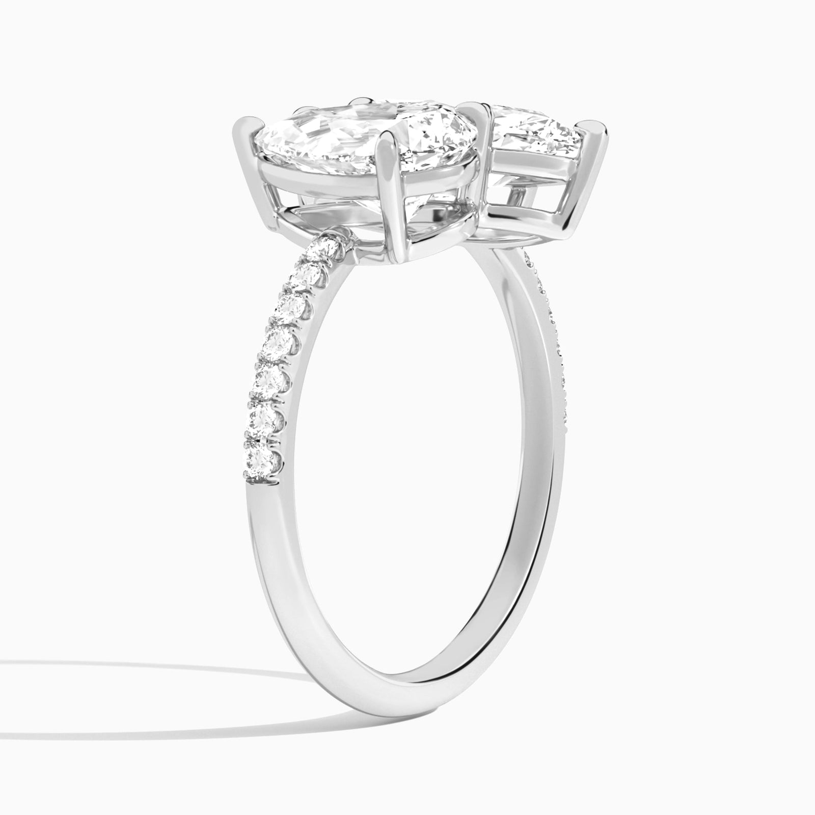 Toi Et Moi Pear and Marquise Accented Diamond Engagement Ring In Platinum, Angle View