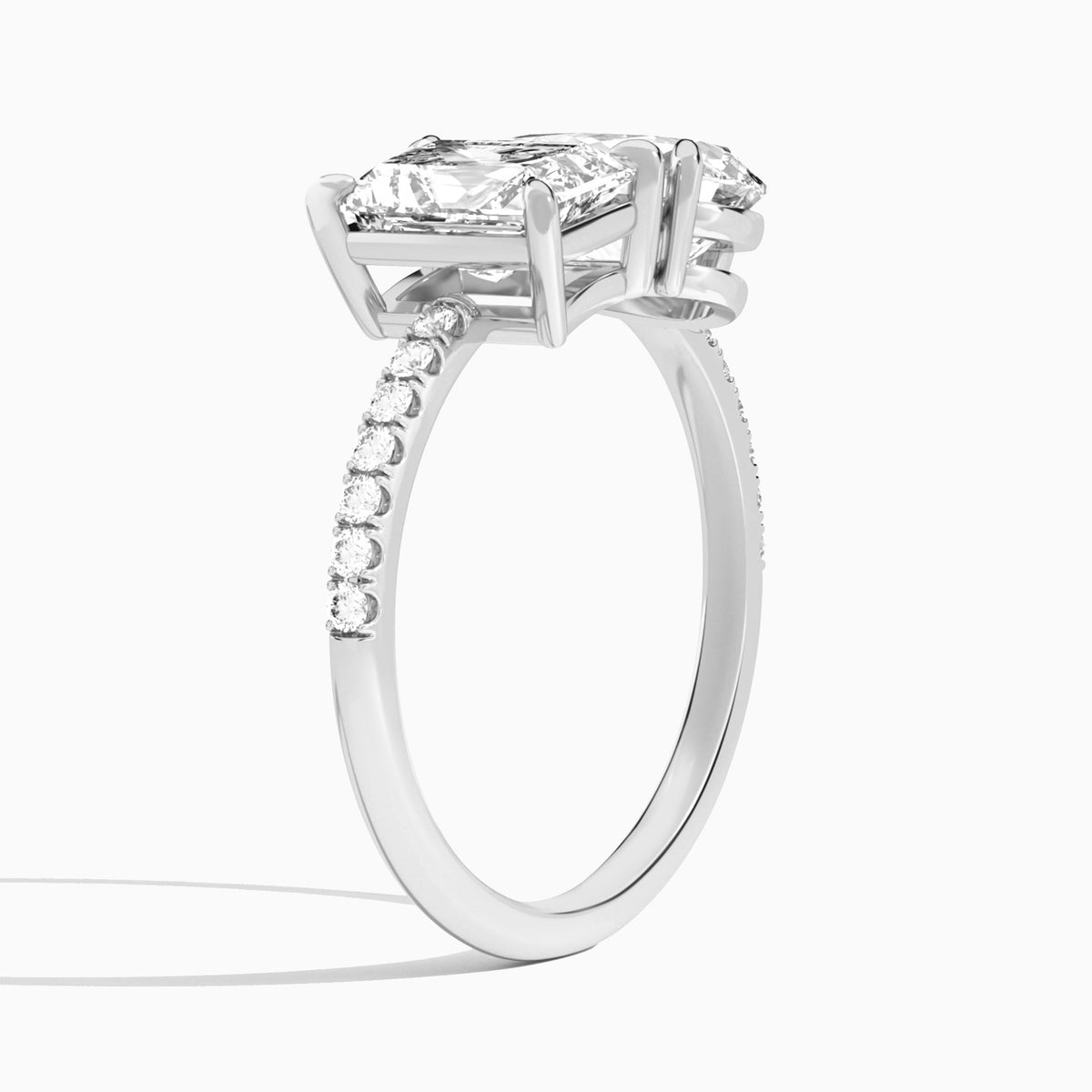 Toi Et Moi Radiant and Pear Accented Diamond Engagement Ring In Platinum, Angle View