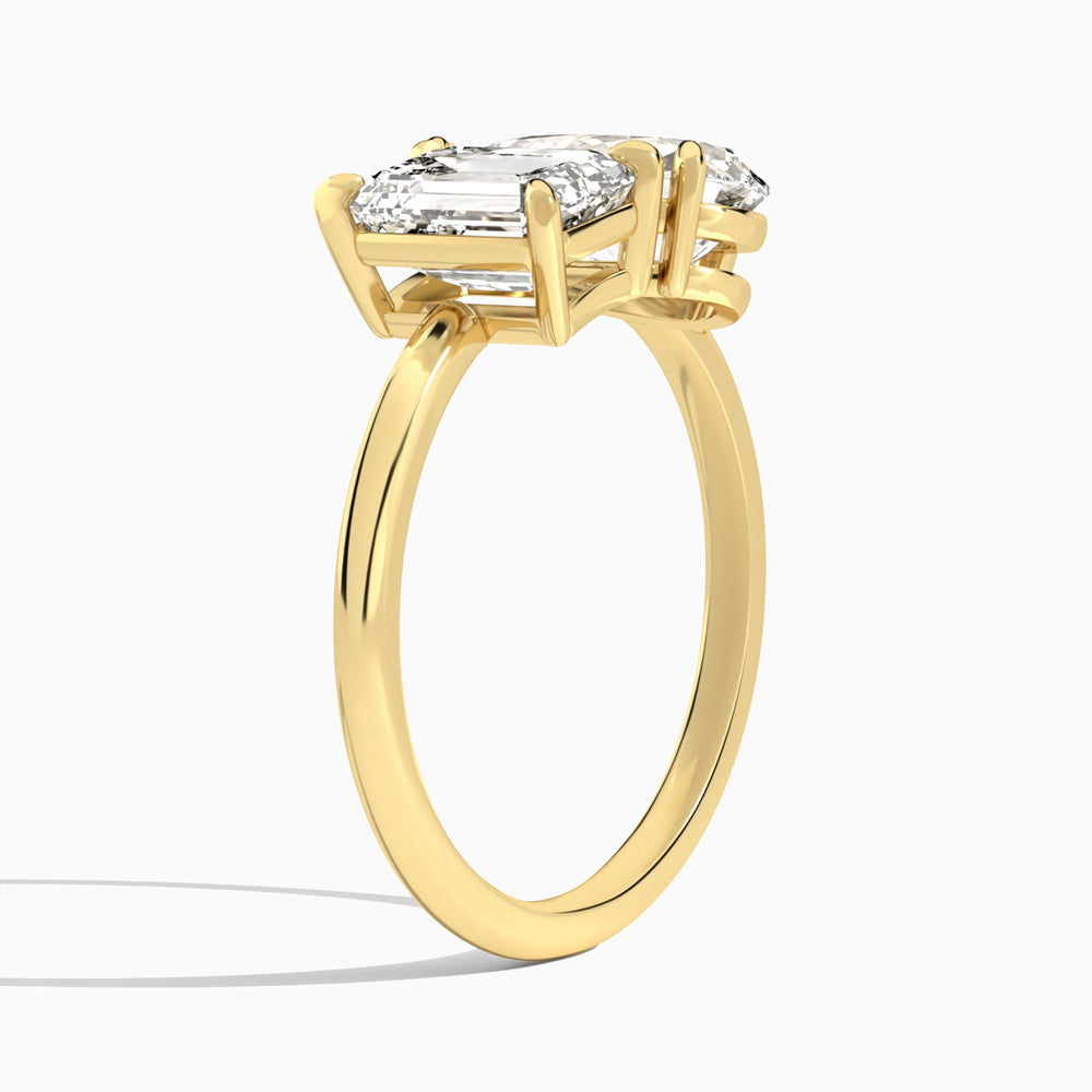 Toi Et Moi Emerald and Pear Diamond Engagement Ring In 14K Yellow Gold, Angle View