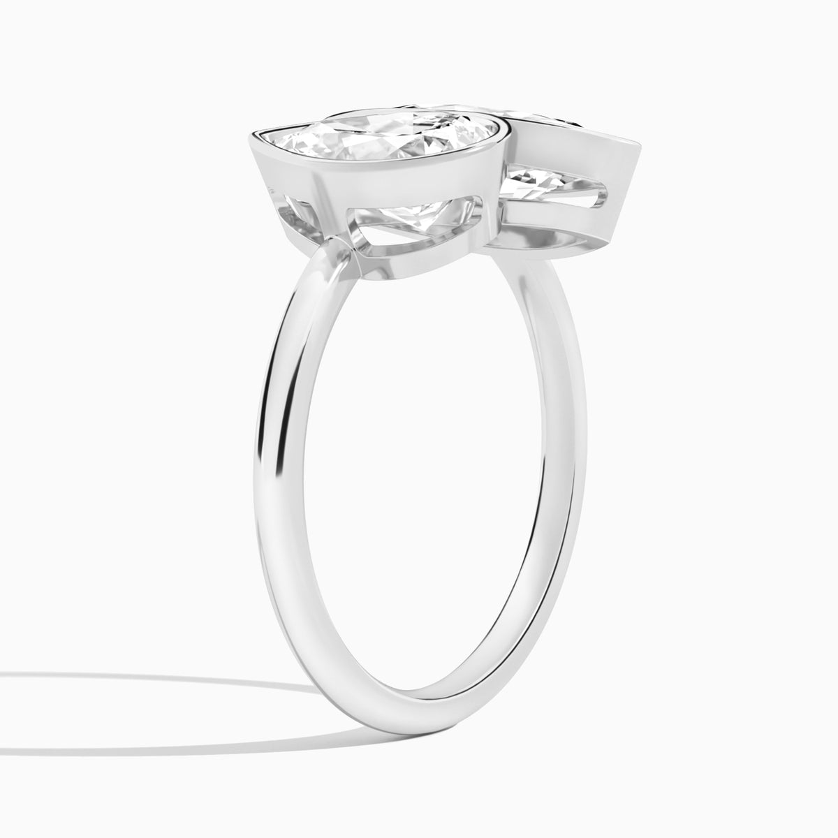 Bezel Toi Et Moi Pear and Marquise Diamond Engagement Ring In Platinum, Angle View