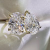 Oval and pear cut Toi et Moi ring, yellow gold two-stone engagement ring, custom diamond bridal jewelry, unique pear and oval diamond ring.