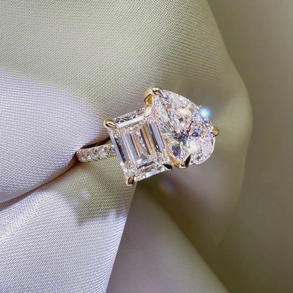 Emerald and pear cut Toi et Moi ring, yellow gold pavé band engagement ring, two-stone bridal jewelry, custom Toi et Moi diamond ring.